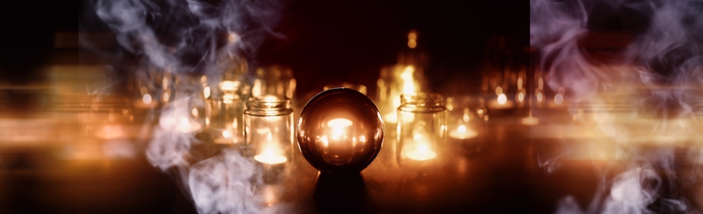 Black,Background,With,Ball,And,Candles.,Divination,And,Prediction,Of